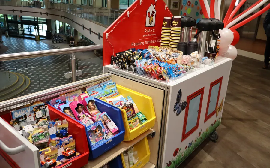 The Care Cart stocked with snacks, toys and comfort items.